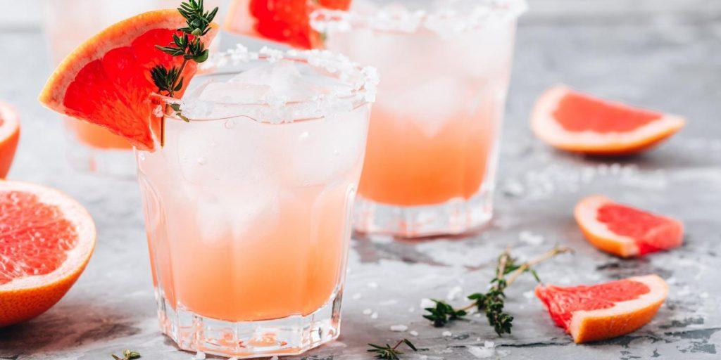 Grapefruit Fizz - Refreshing Grapefruit Fizz cocktail with vibrant colours and a fizzy texture.