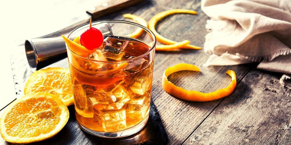 Brown Sugar Old Fashioned with cherries and orange slices