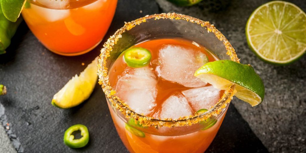 Mexican firing squad with lime and grenadine with spicy rim from above