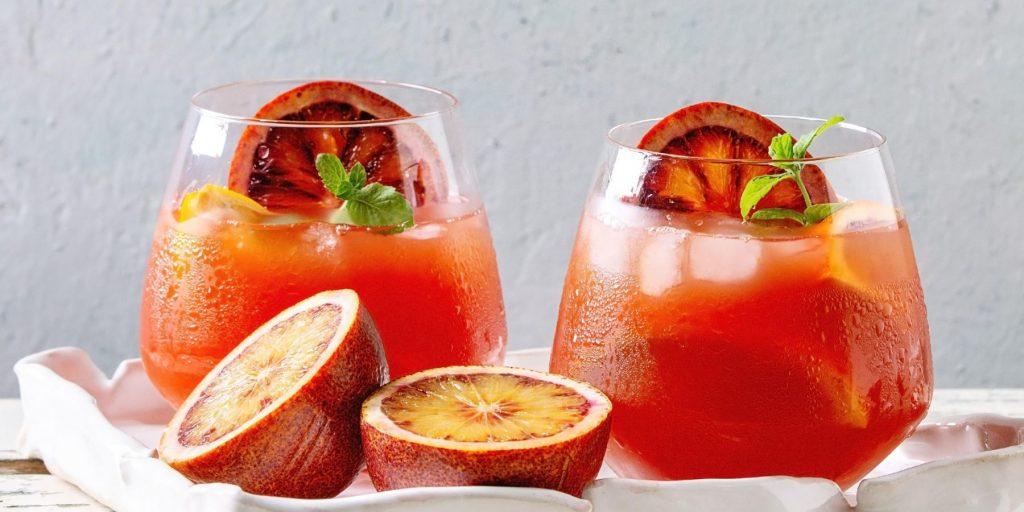 Blood Orange vodka cocktails with mint in tumblers