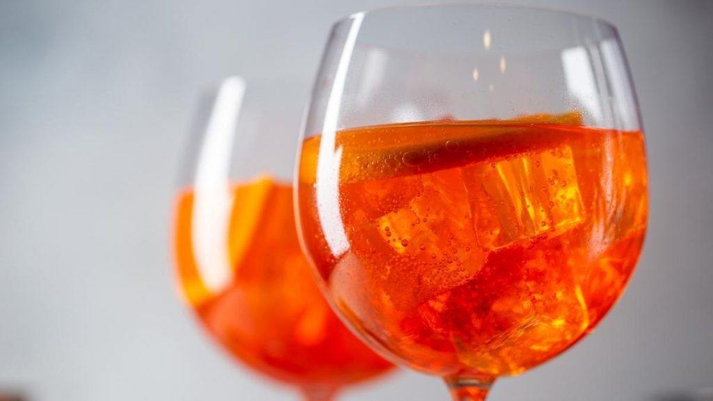 Bright aperol spritz on ice