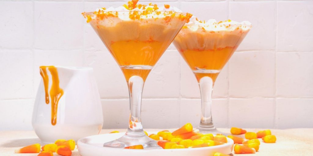 Two Candy Corn Martinis with candy corn garnish