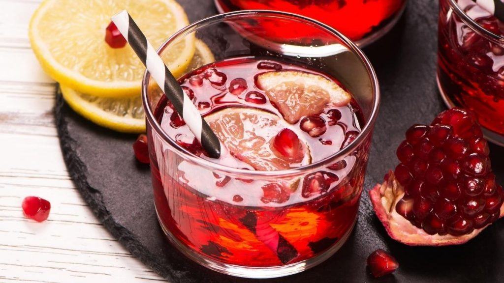 Festive looking Pomegranate Margarita on the rocks