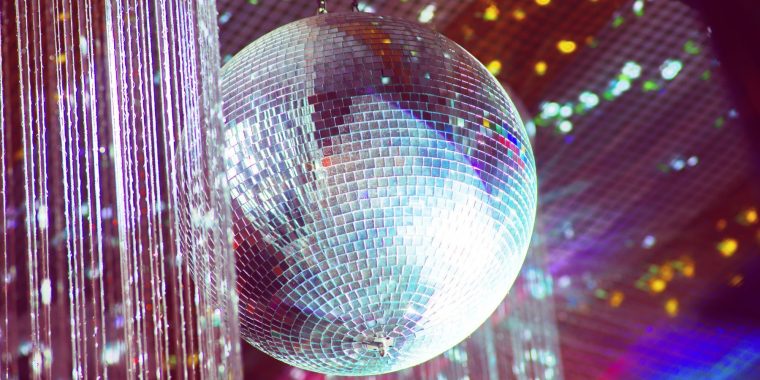 Image of disco ball and colorful lighting