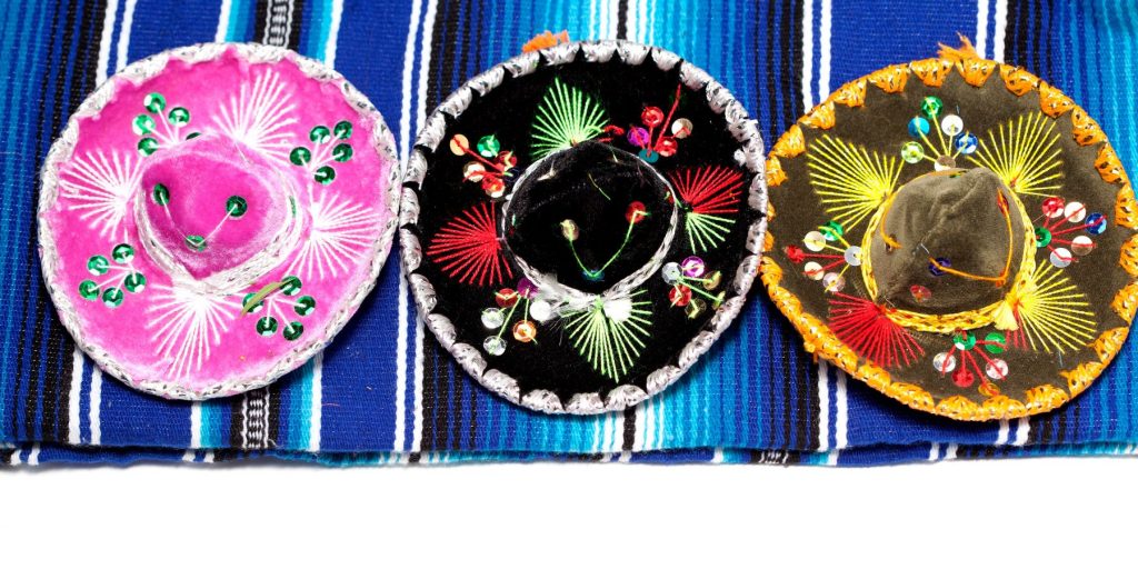 Three colorful sombreros, side by side