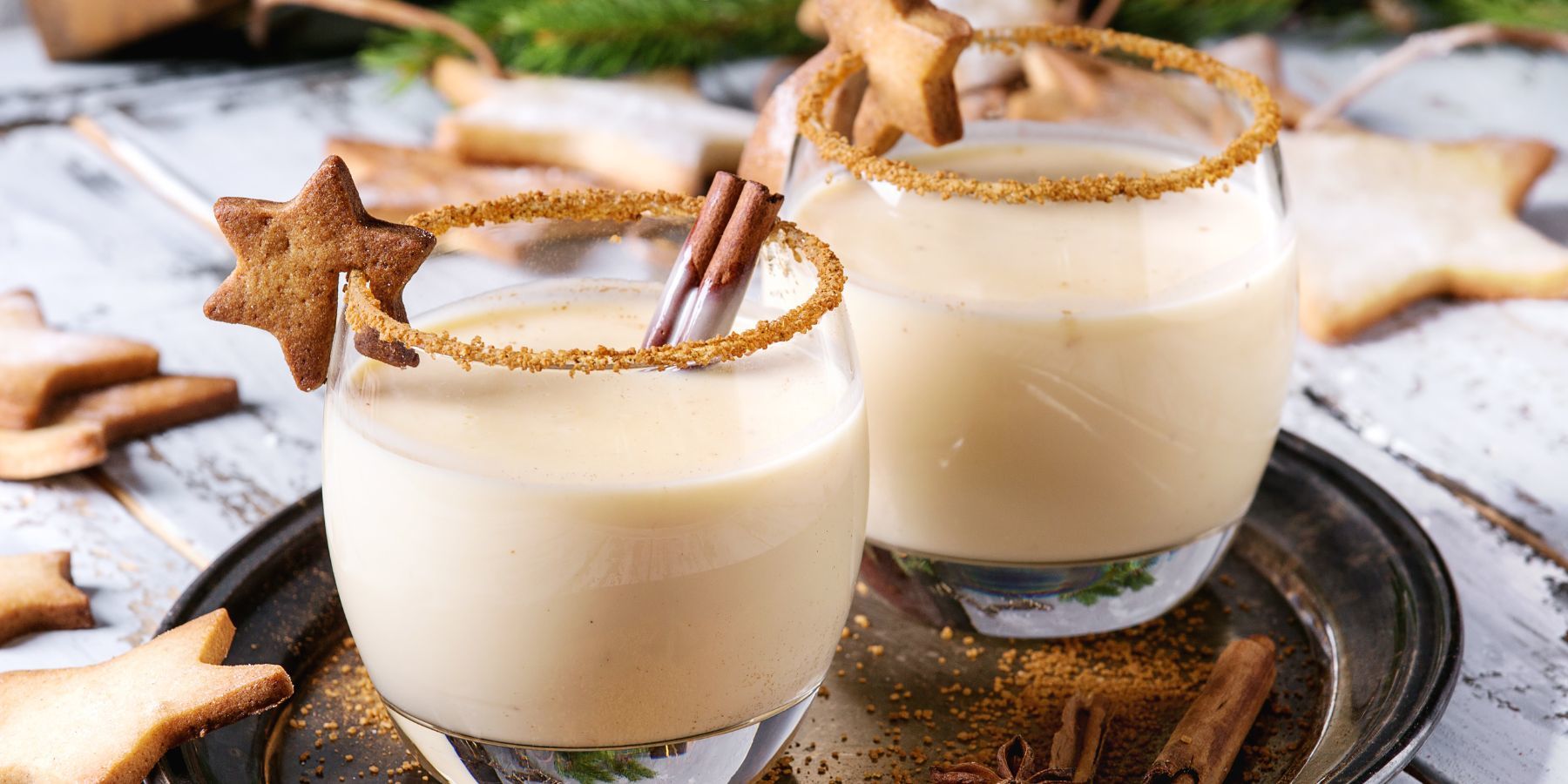 Eggnog Christmas cocktail with cinnamon and stars