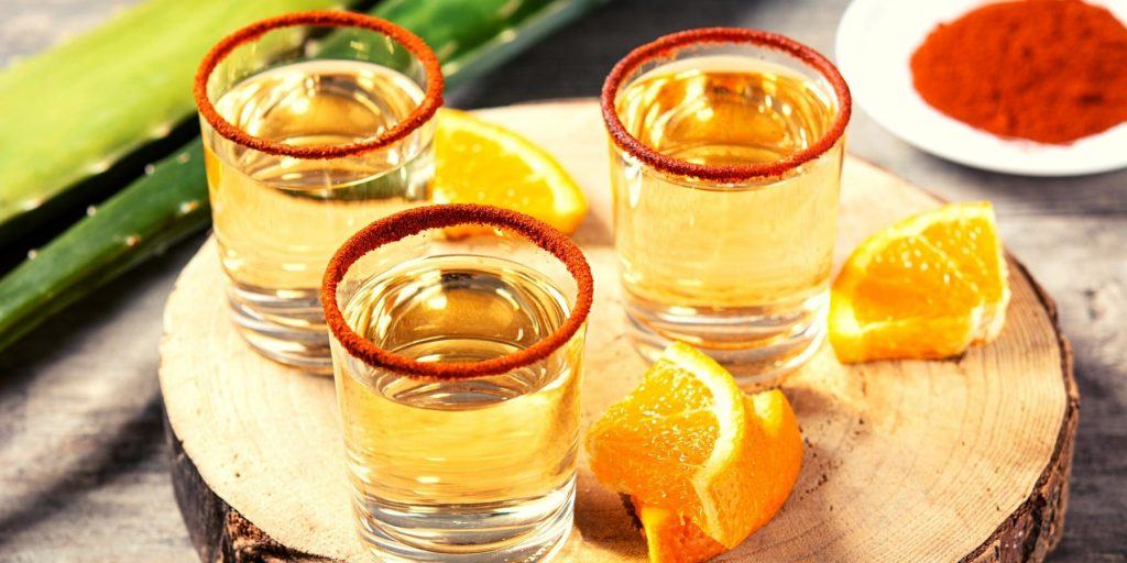 Mezcal shots with chilli spice rim