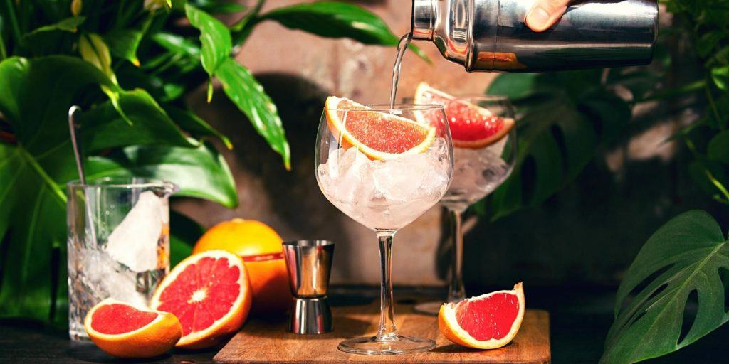 Mezcal Paloma with grapefruit wedges