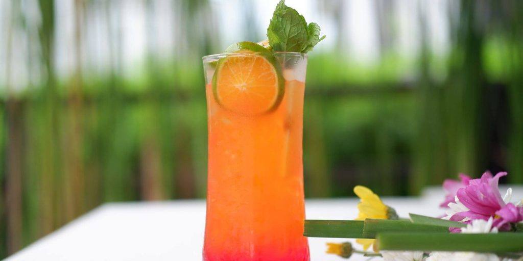 A Rum punch in a tall glass