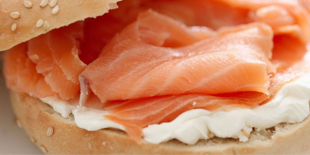 Close up of a lox bagel with cream cheese