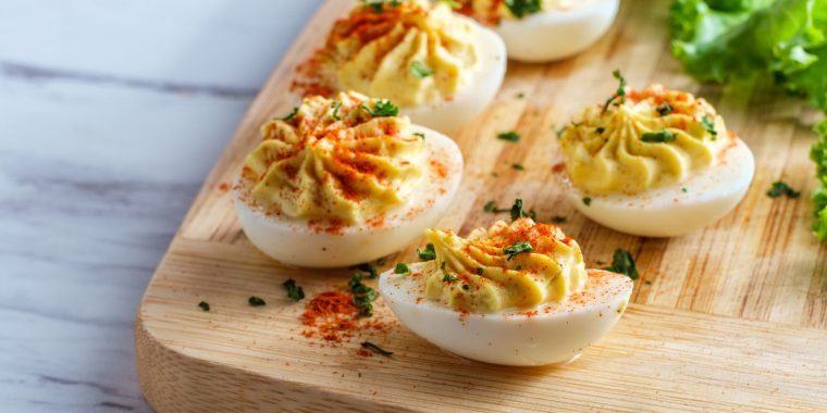 60s Theme Party Devilled Eggs - Devilled eggs with a retro twist, ideal for a 60s-themed party.