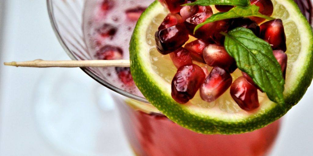 Lime wheel with pomegranate garnish