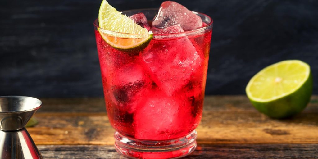 Bright and refreshing vodka cranberry on ice with lime