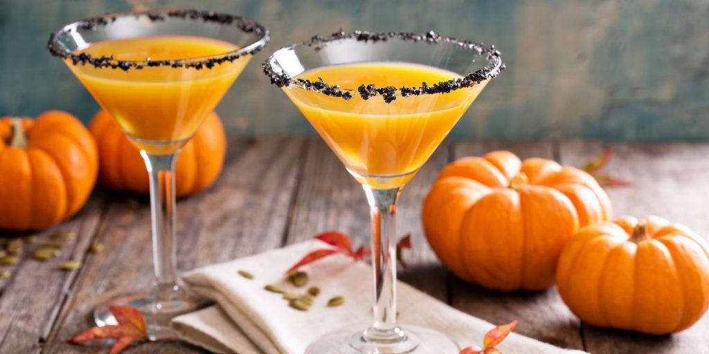 Pumpkin Martini with small pumpkins in the background