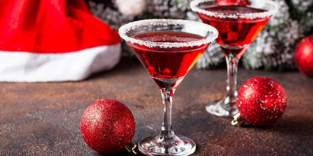 Bright red Christmas Martinis with sugared rims