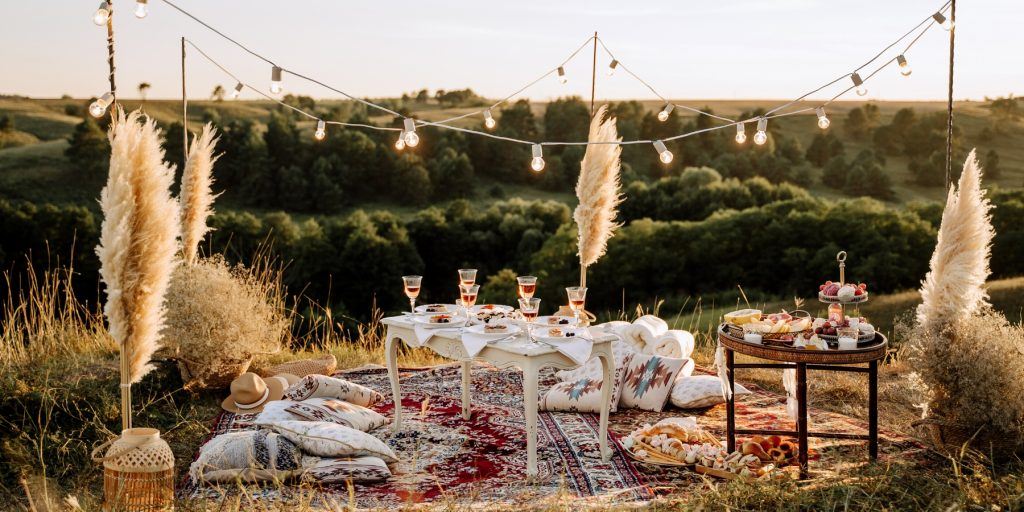 Outdoor picnic set up with lights