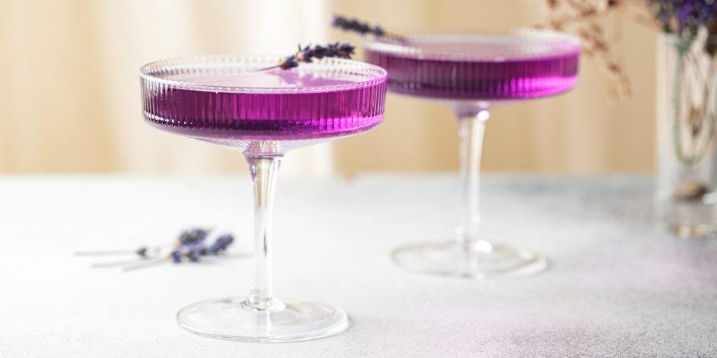 Two purple Jamuntini cocktails