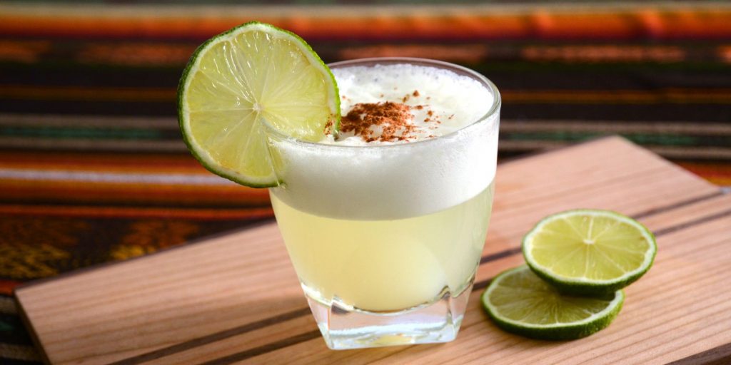 A daring and delicious Coconut Gin Sour cocktail that's vegan-friendly