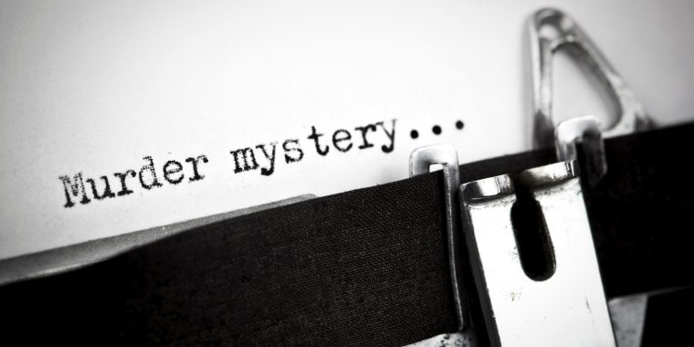 Typewriter with the word Murder Mystery typed on paper