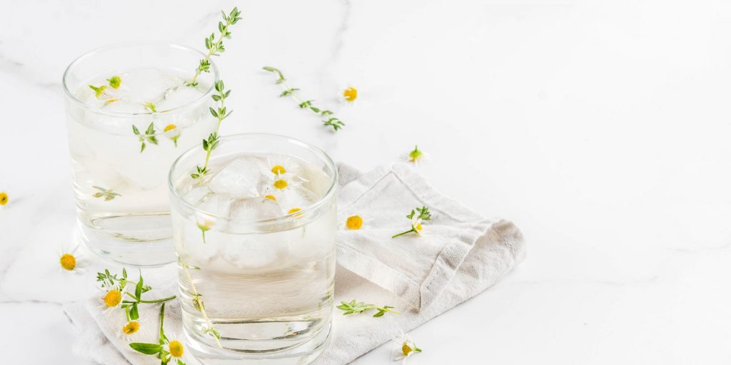 A lovely pair of Thyme Elderflower Gimlet cocktails that are sensational to sip in spring and summer