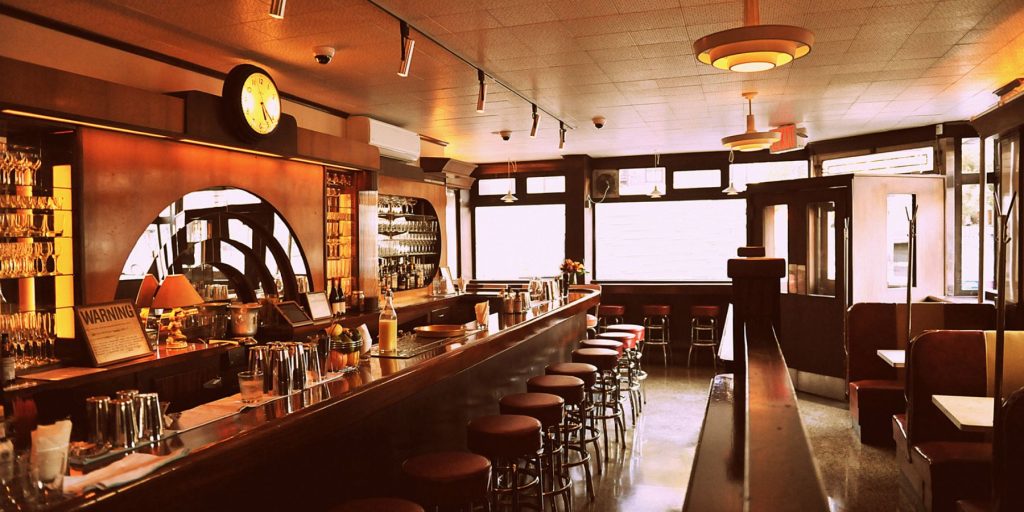 Wide shot of the bar inside the Long Island Bar in NYC that has been run by the Sullivan family since the 1950s