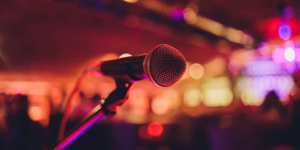 Close up of a karoake microphone set up for a New Year's Eve party