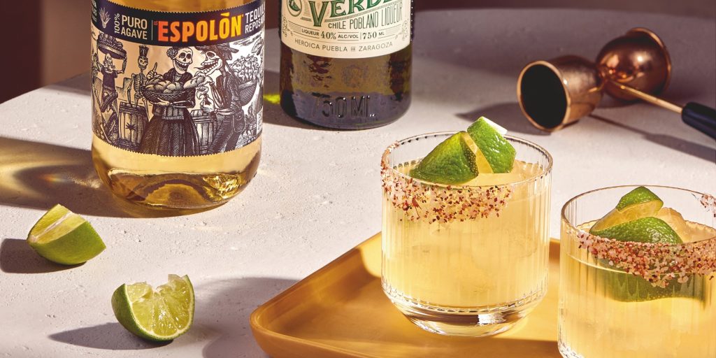 Two Spicy Espolòn Margaritas with lime garnish
