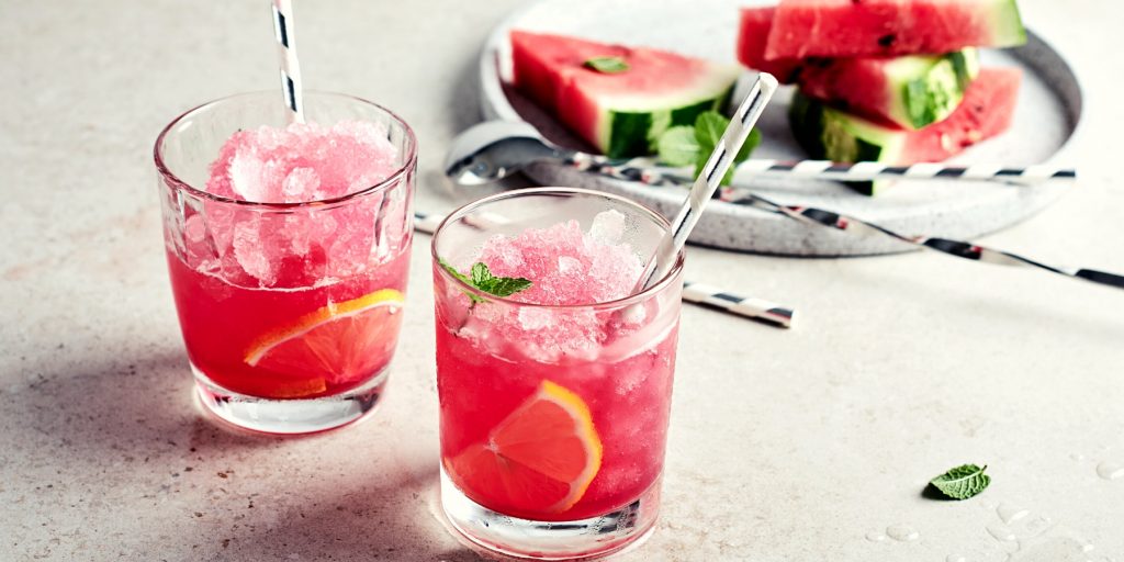 Two Watermelon Gin cocktails served over ice in tumblers