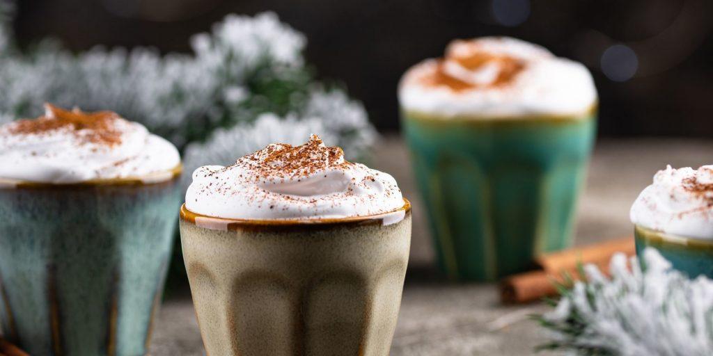 3 Christmassy Tom and Jerry cocktails in cemaric mugs