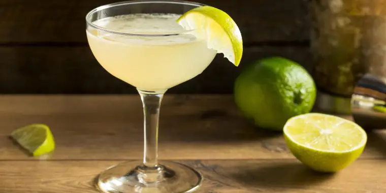 Classic Lime Daiquiri in coupe glass garnished with lime