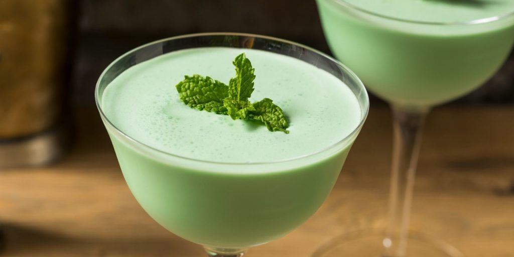 Pale green Grasshopper cocktail served in coupe glass