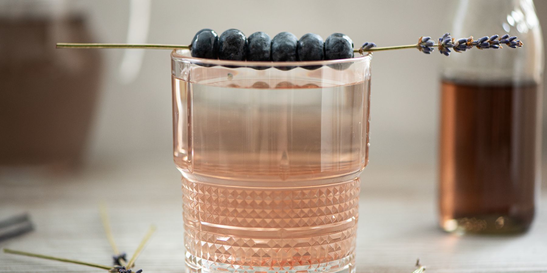 Cocktail with lavender syrup and blueberries