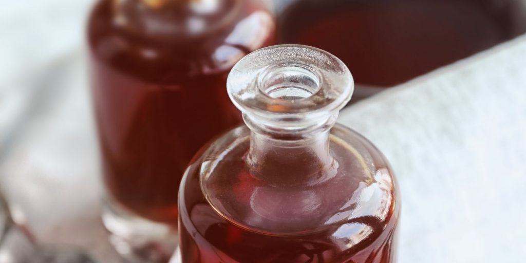 close up of home made bitters in bottles