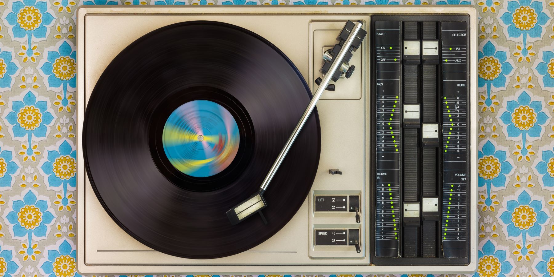 Vinyl player on 70s wallpaper