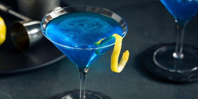 Blue Martini with a lemon twist garnish