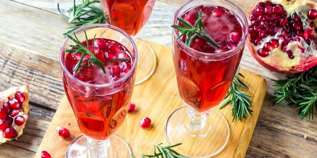 Red Poinsetta Champagne cocktails with pomegranate garnish