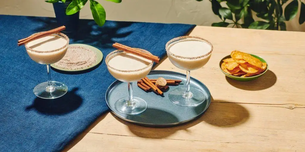Top view of delicious Brandy Alexander Cocktails garnished with cinnamon sticks