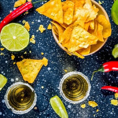 Mezcal shots, chillies, lime and nachos