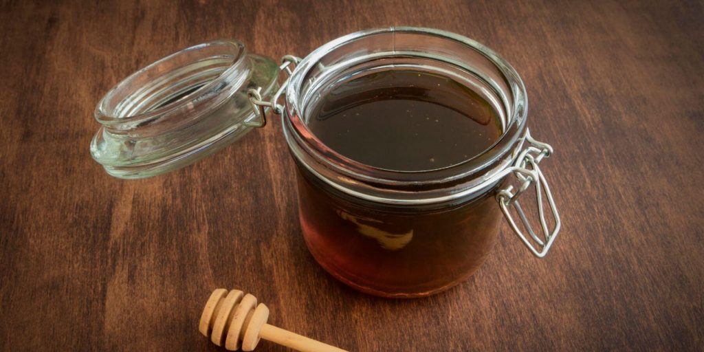 Rich syrup in a glass jar