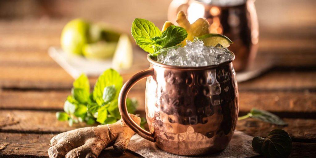 mexican mule in a copper cup with tequila and mint