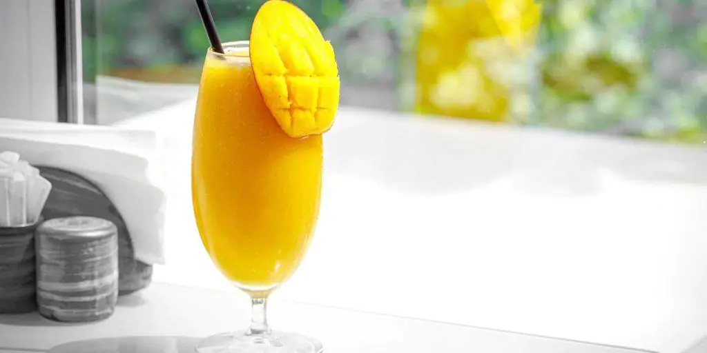 Mango cooler topped with bubbly