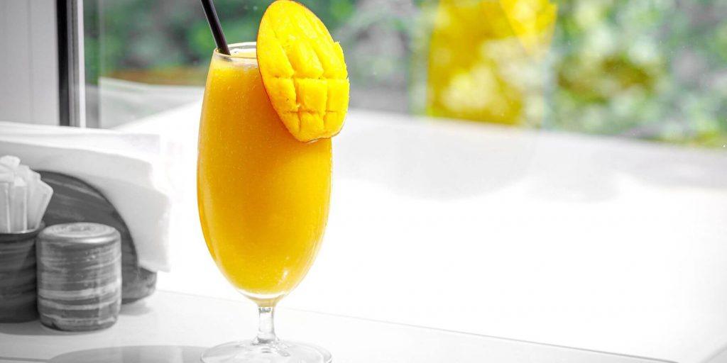 Mango cooler topped with bubbly