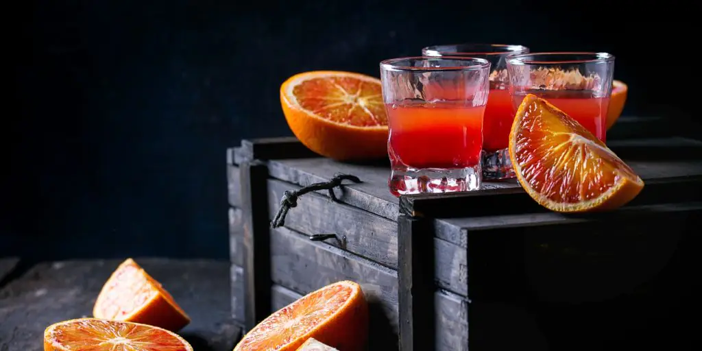 Two Red Dragon cocktails with blood oranges