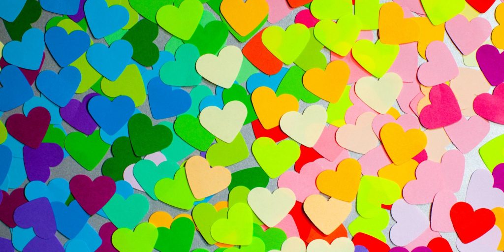 Close up of rainbow heart confetti for a Cocktail Color Party