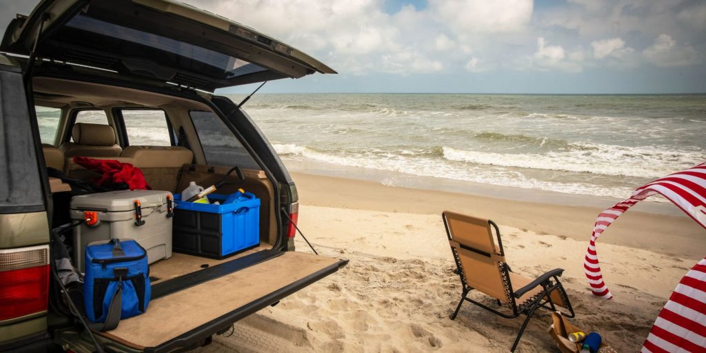 A tailgating party set-up on a beach