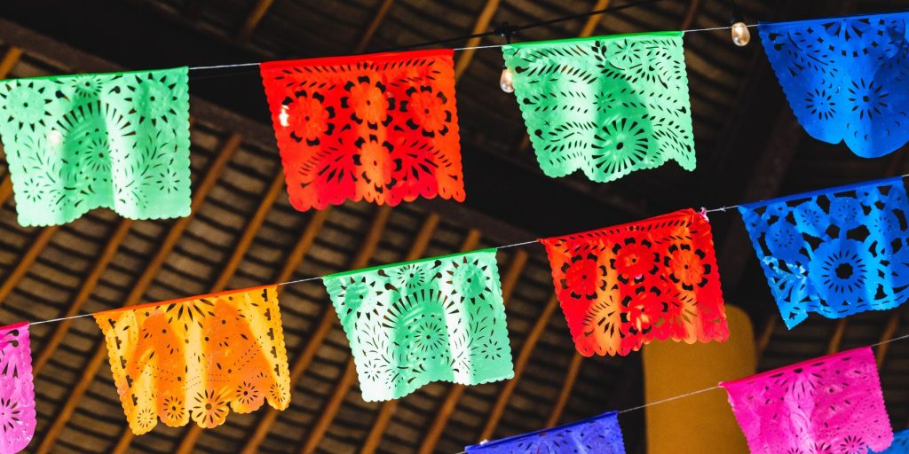 Papel picado strung up for a Day of the Dead party at home